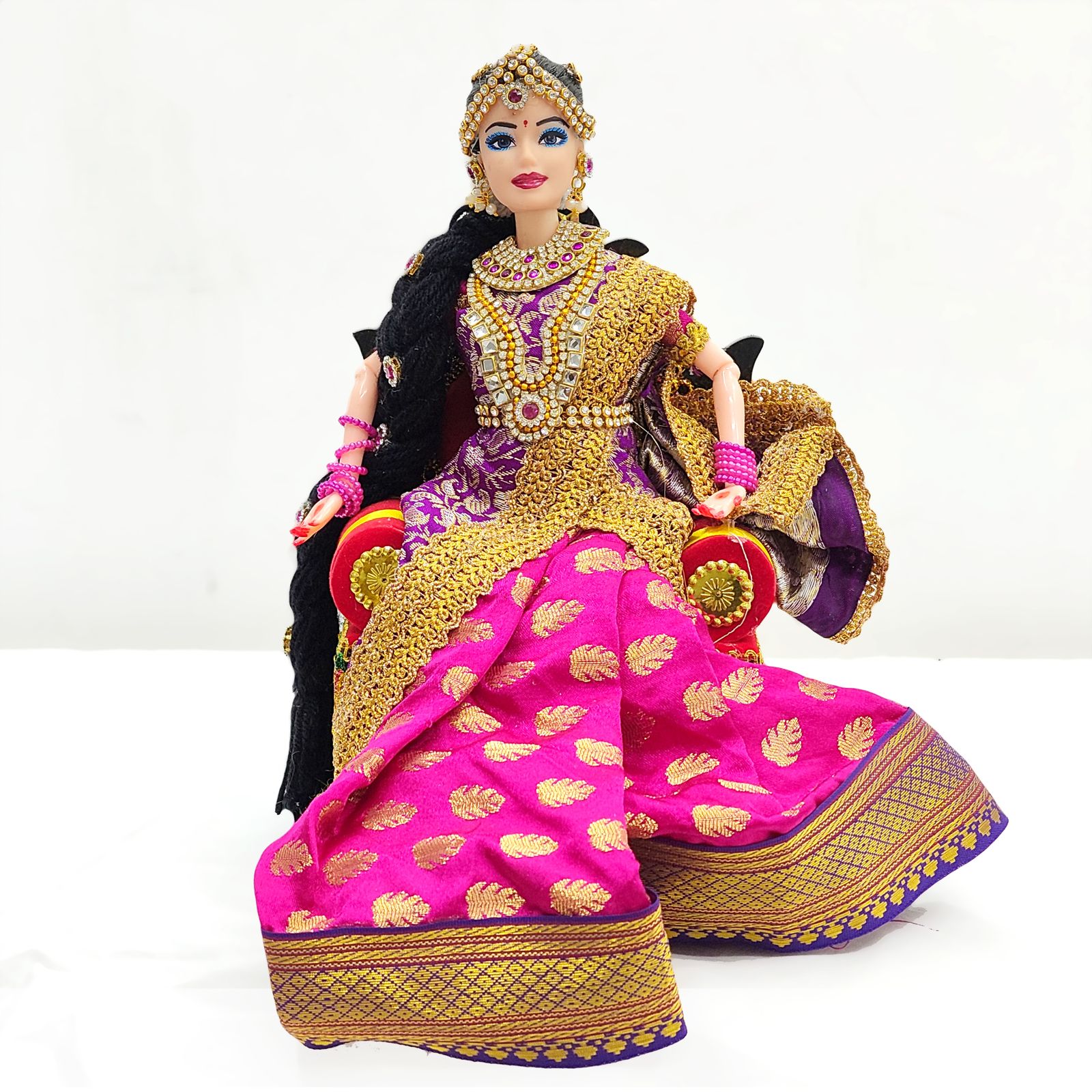 Elegant Indian Bride Doll in Green Saree with Traditional Accessories